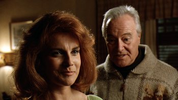 Movie still from “Grumpy Old Men” (1993), directed by Donald Petrie – An older man and a younger woman standing next to each other; Close Up shot, Low angle