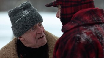 Movie still from “Grumpy Old Men” (1993), directed by Donald Petrie – An older man and a younger man talking to each other; Close Up shot, Over the shoulder angle