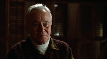 Movie still from “Grumpy Old Men” (1993), directed by Donald Petrie – An older man with a white beard and a brown jacket; Close Up shot, Low angle