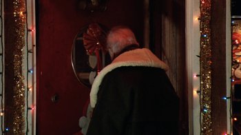 Movie still from “Grumpy Old Men” (1993), directed by Donald Petrie – An older man looking into a mirror in a dark room; Close Up shot, Over the shoulder angle