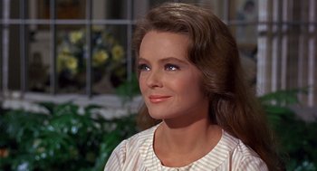 Movie still from “Guess Who's Coming to Dinner” (1967), directed by Stanley Kramer – A woman's face in front of a window; Close Up shot, Over the shoulder angle