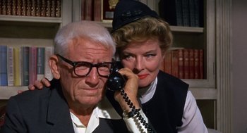 Movie still from “Guess Who's Coming to Dinner” (1967), directed by Stanley Kramer – An older man and a younger woman on the phone; Close Up shot, Low angle