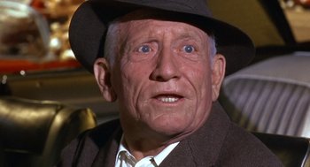 Movie still from “Guess Who's Coming to Dinner” (1967), directed by Stanley Kramer – An older man wearing a hat and a suit; Close Up shot, Low angle