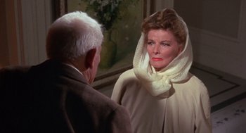 Movie still from “Guess Who's Coming to Dinner” (1967), directed by Stanley Kramer – An older man and a woman looking at each other; Close Up shot, Over the shoulder angle