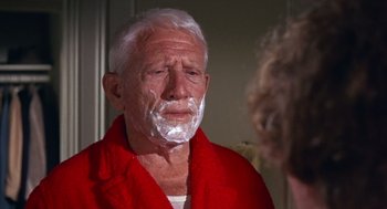 Movie still from “Guess Who's Coming to Dinner” (1967), directed by Stanley Kramer – An older man with a shaving foam on his face; Close Up shot, Over the shoulder angle