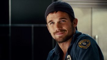 Movie still from “Trespass” (2011), directed by Joel Schumacher – A person wearing a hat; Close Up shot, Over the shoulder angle