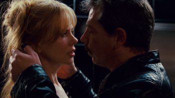 Movie still from “Trespass” (2011), directed by Joel Schumacher – A man and a woman face to face in the dark; Close Up shot, Low angle