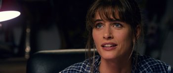 Movie still from “Gulliver's Travels” (2010), directed by Rob Letterman – A person wearing a plaid shirt; Close Up shot, Over the shoulder angle