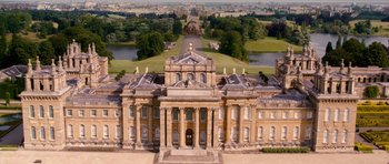 Movie still from “Gulliver's Travels” (2010), directed by Rob Letterman – An aerial view of a large building in a park setting; Extreme Wide shot, High angle