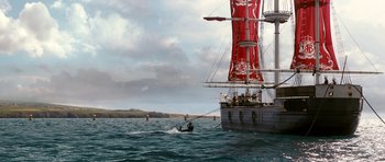 Movie still from “Gulliver's Travels” (2010), directed by Rob Letterman – A person on a boat in the water; Extreme Wide shot, Low angle