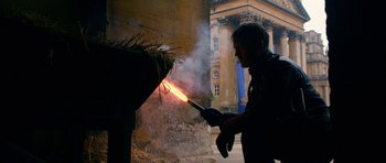 Movie still from “Gulliver's Travels” (2010), directed by Rob Letterman – A man is holding a fire in his hand; Medium shot, Low angle