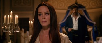 Movie still from “Gulliver's Travels” (2010), directed by Rob Letterman – A woman with long brown hair wearing a white shirt; Close Up shot, Over the shoulder angle