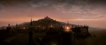 Movie still from “Gulliver's Travels” (2010), directed by Rob Letterman – An image of a city at night with a castle in the background; Extreme Wide shot, High angle
