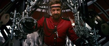 Movie still from “Gulliver's Travels” (2010), directed by Rob Letterman – A man in a red jacket and a helmet; Medium shot, Low angle