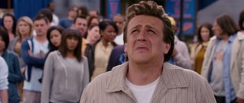 Movie still from “Gulliver's Travels” (2010), directed by Rob Letterman – A group of people standing in front of each other; Close Up shot, Low angle