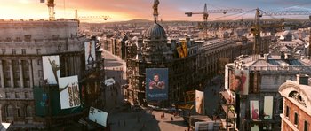 Movie still from “Gulliver's Travels” (2010), directed by Rob Letterman – An aerial view of a large city with a lot of people walking around it; Extreme Wide shot, High angle