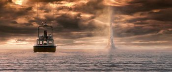 Movie still from “Gulliver's Travels” (2010), directed by Rob Letterman – A boat in the water near a body of water; Extreme Wide shot, High angle