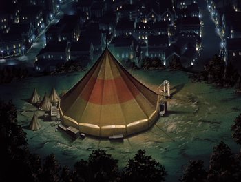 Movie still from “Gundam Wing: The Movie - Endless Waltz” (1998), directed by Yasunao Aoki – An aerial view of a tent in the middle of the night; Extreme Wide shot, High angle