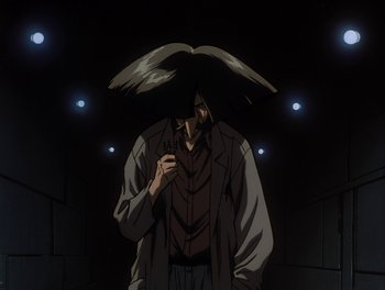 Movie still from “Gundam Wing: The Movie - Endless Waltz” (1998), directed by Yasunao Aoki – A man with an umbrella standing in a dark room; Medium shot, Low angle