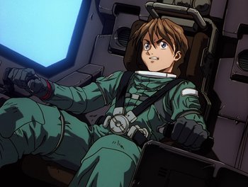 Movie still from “Gundam Wing: The Movie - Endless Waltz” (1998), directed by Yasunao Aoki – An anime character sitting in the back of an airplane; Medium shot, High angle