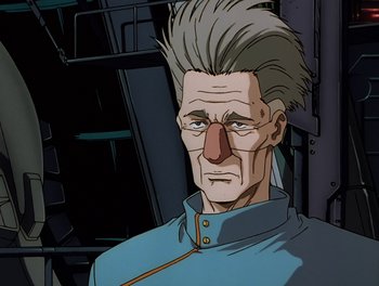 Movie still from “Gundam Wing: The Movie - Endless Waltz” (1998), directed by Yasunao Aoki – An old man with a nose ring and a mustache; Close Up shot, Low angle