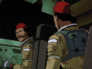 Movie still from “Gundam Wing: The Movie - Endless Waltz” (1998), directed by Yasunao Aoki – An animated picture of a man in a space suit looking at himself in the mirror; Medium shot, Low angle