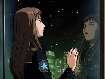Movie still from “Gundam Wing: The Movie - Endless Waltz” (1998), directed by Yasunao Aoki – A woman and a man looking at each other in front of a city skyline at night; Close Up shot, Low angle