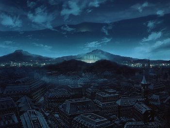 Movie still from “Gundam Wing: The Movie - Endless Waltz” (1998), directed by Yasunao Aoki – An aerial view of a city at night with mountains in the background; Extreme Wide shot, High angle