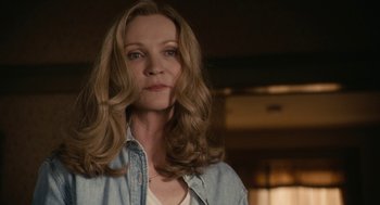 Movie still from “Hachi: A Dog's Tale” (2009), directed by Lasse Hallström – A person with long hair; Close Up shot, Low angle