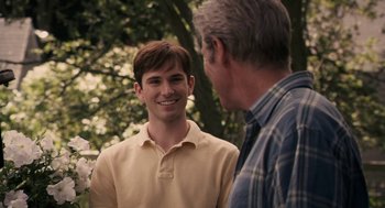 Movie still from “Hachi: A Dog's Tale” (2009), directed by Lasse Hallström – A man and an older man are talking outside; Medium shot, Over the shoulder angle