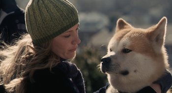 Movie still from “Hachi: A Dog's Tale” (2009), directed by Lasse Hallström – A woman and a dog looking at each other; Close Up shot, Over the shoulder angle