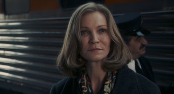 Movie still from “Hachi: A Dog's Tale” (2009), directed by Lasse Hallström – A person wearing a jacket; Close Up shot, Low angle