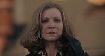 Movie still from “Hachi: A Dog's Tale” (2009), directed by Lasse Hallström – A person wearing a jacket; Close Up shot, Low angle