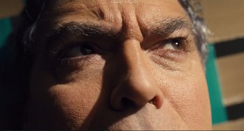 Movie still from “Hail, Caesar!” (2016), directed by Ethan Coen – A man's eyes and face; Extreme Close Up shot, Low angle