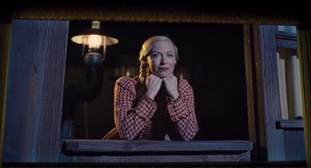 Movie still from “Hail, Caesar!” (2016), directed by Ethan Coen – A woman sitting in front of a mirror in a room; Medium shot, Low angle