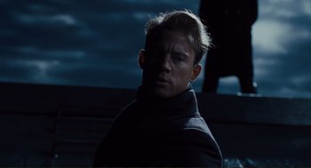 Movie still from “Hail, Caesar!” (2016), directed by Ethan Coen – A person wearing a black jacket; Close Up shot, Low angle