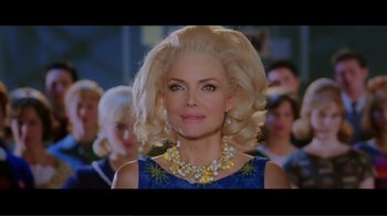 Movie still from “Hairspray” (2007), directed by Adam Shankman – A woman with blonde hair wearing a blue dress; Close Up shot, Low angle