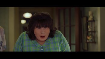 Movie still from “Hairspray” (2007), directed by Adam Shankman – A woman in a green shirt is looking surprised; Medium shot, Low angle