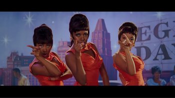 Movie still from “Hairspray” (2007), directed by Adam Shankman – A group of three women standing next to each other; Medium shot, Low angle