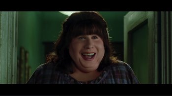 Movie still from “Hairspray” (2007), directed by Adam Shankman – A person with a big smile on their face; Close Up shot, Over the shoulder angle