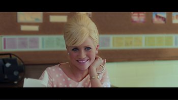 Movie still from “Hairspray” (2007), directed by Adam Shankman – A young woman with blonde hair and blue eyes; Medium shot, High angle