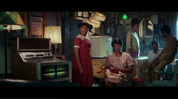 Movie still from “Hairspray” (2007), directed by Adam Shankman – A group of people standing in a room; Wide shot, Low angle