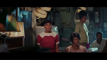 Movie still from “Hairspray” (2007), directed by Adam Shankman – A man and a woman sitting in a room; Medium shot, Over the shoulder angle