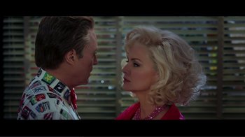 Movie still from “Hairspray” (2007), directed by Adam Shankman – A man and a woman face to face in front of a window; Close Up shot, Over the shoulder angle