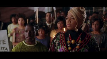 Movie still from “Hairspray” (2007), directed by Adam Shankman – A group of people standing in front of candles; Close Up shot, Over the shoulder angle