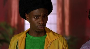 Movie still from “Half Baked” (1998), directed by Tamra Davis – A person wearing a jacket; Close Up shot, High angle