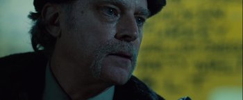 Movie still from “Halloween” (2007), directed by Rob Zombie – A person with a beard and mustache; Close Up shot, Low angle