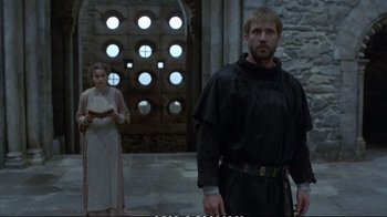 Movie still from “Hamlet” (1990), directed by Franco Zeffirelli – A man and a woman standing in front of a building; Medium shot, Over the shoulder angle