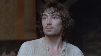Movie still from “Hamlet” (1990), directed by Franco Zeffirelli – A person with long hair; Close Up shot, High angle