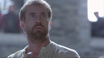 Movie still from “Hamlet” (1990), directed by Franco Zeffirelli – A man with a beard looking up at the sky; Close Up shot, Low angle